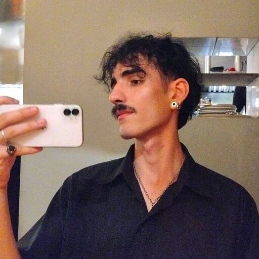 man in black button-up shirt