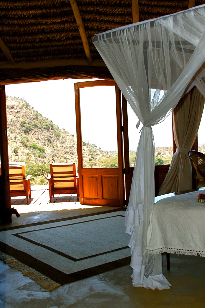 Tree Camp i Mashatu Game Reserve, Botswana – unikt boende byggt på en platå i ett träd, med säng omgiven av myggnät under ridresa med Africa by Horse.
