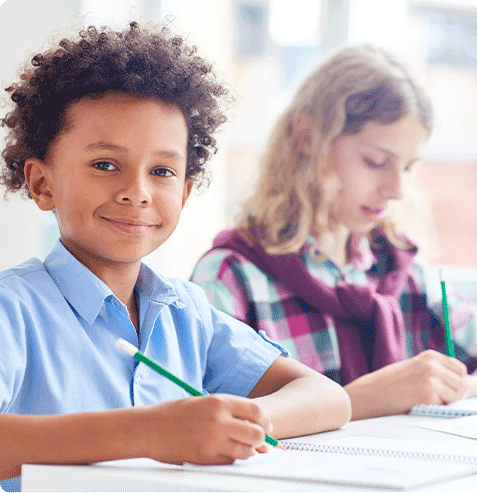 Students developing storytelling and creative writing skills in after school literacy enrichment program