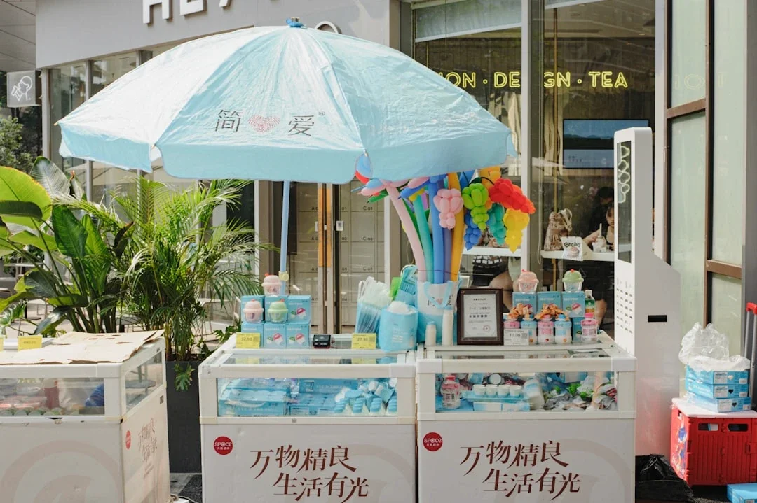Outdoor stall selling refreshing drinks and snacks.