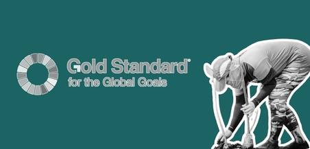 Gold Standard logo and a person planting a tree