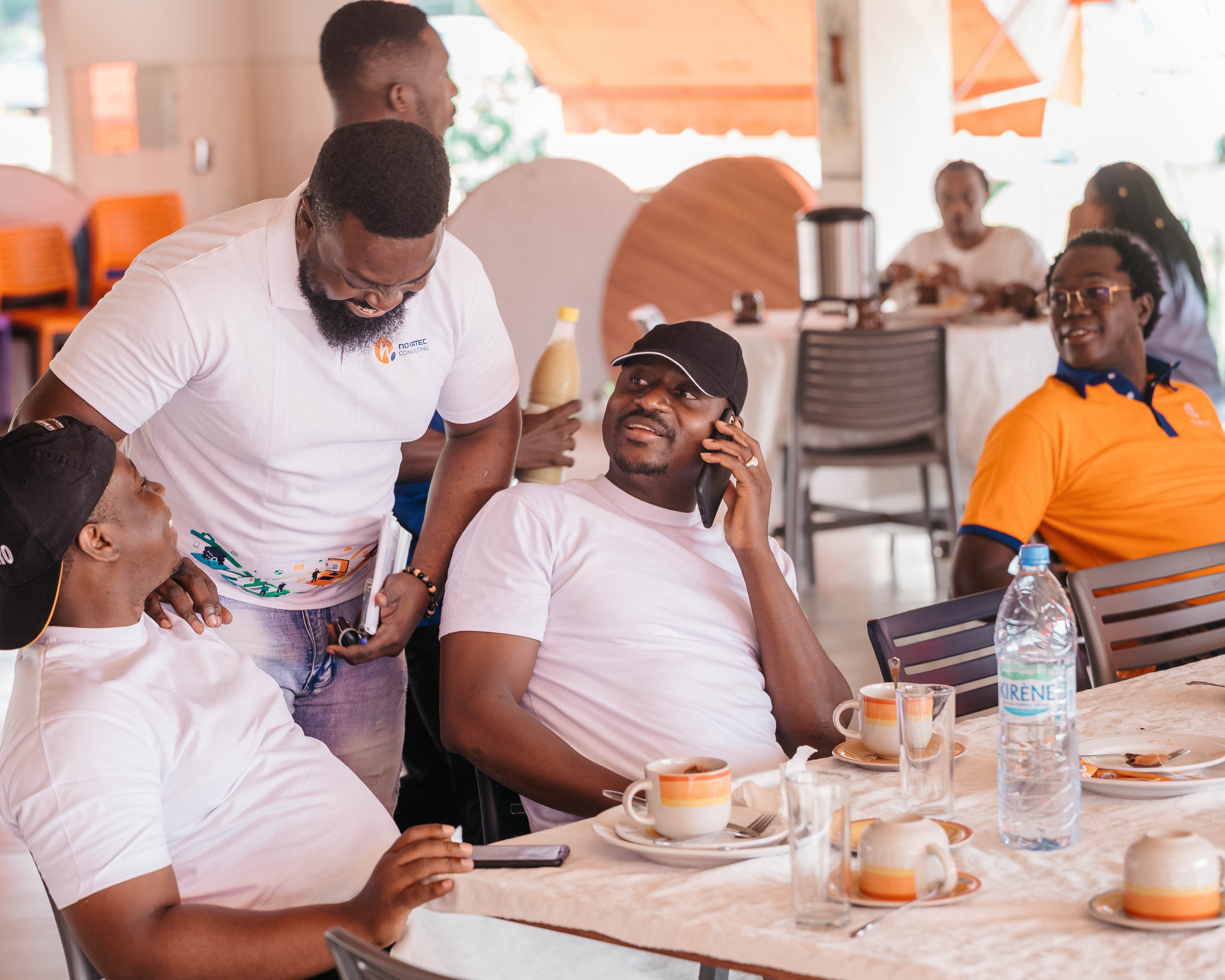 person sitting in a chair in front of a man