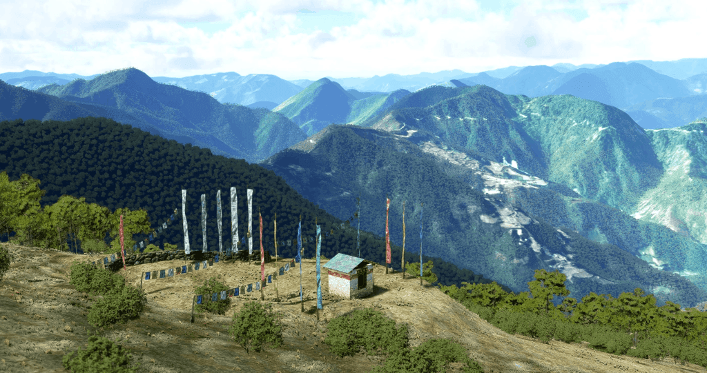 a view of a city and mountains from a distance