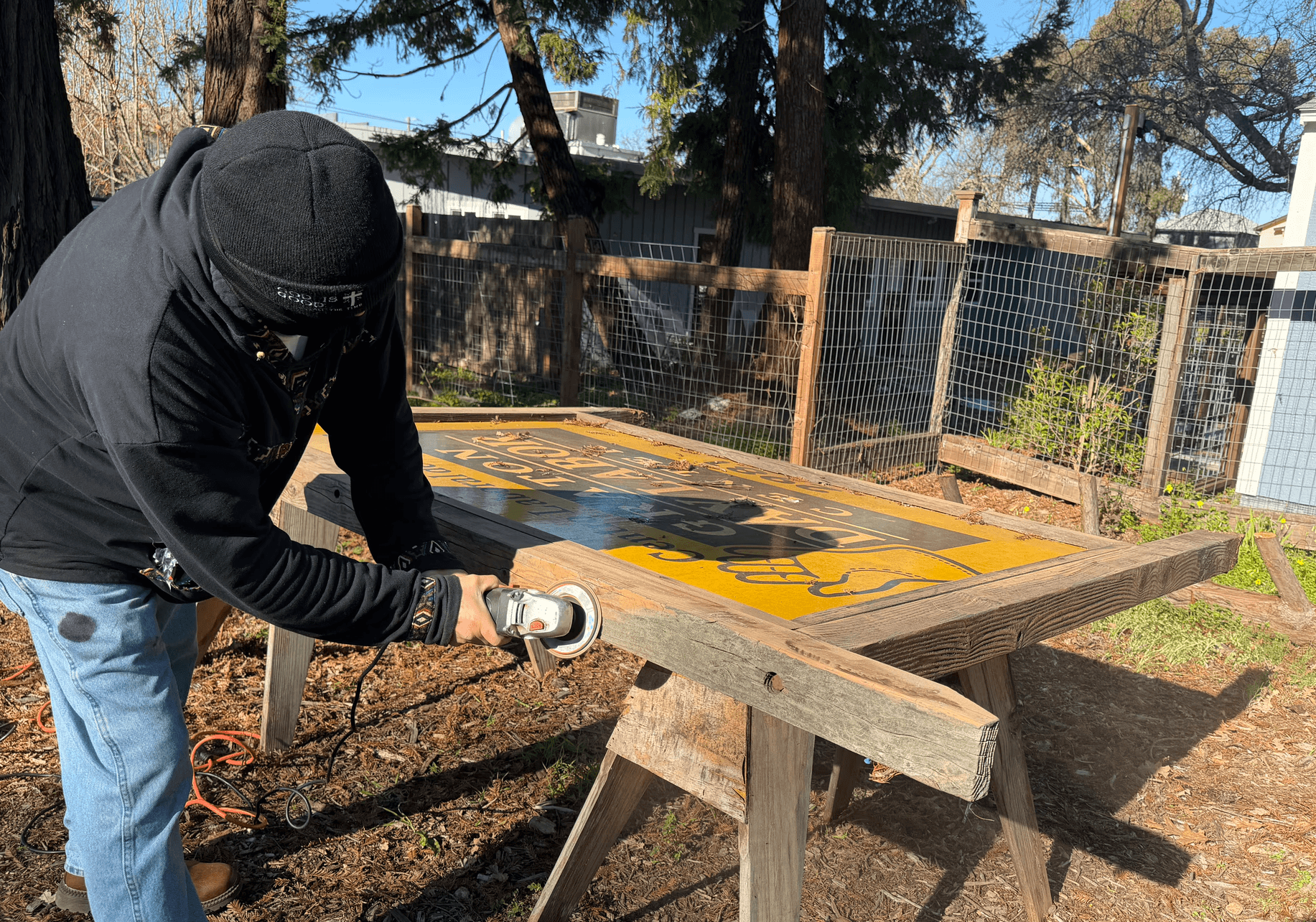 Man using tools to build 