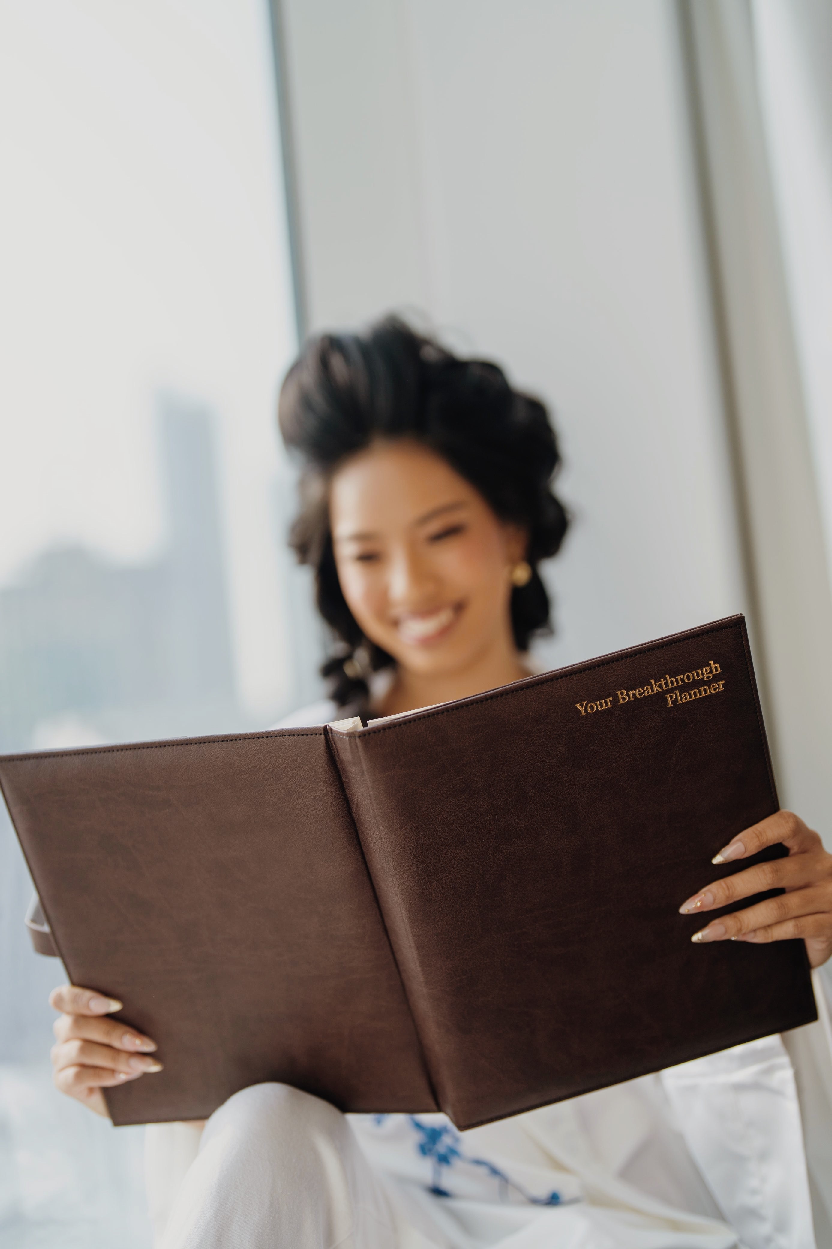 Red fire truck parked inside a station.