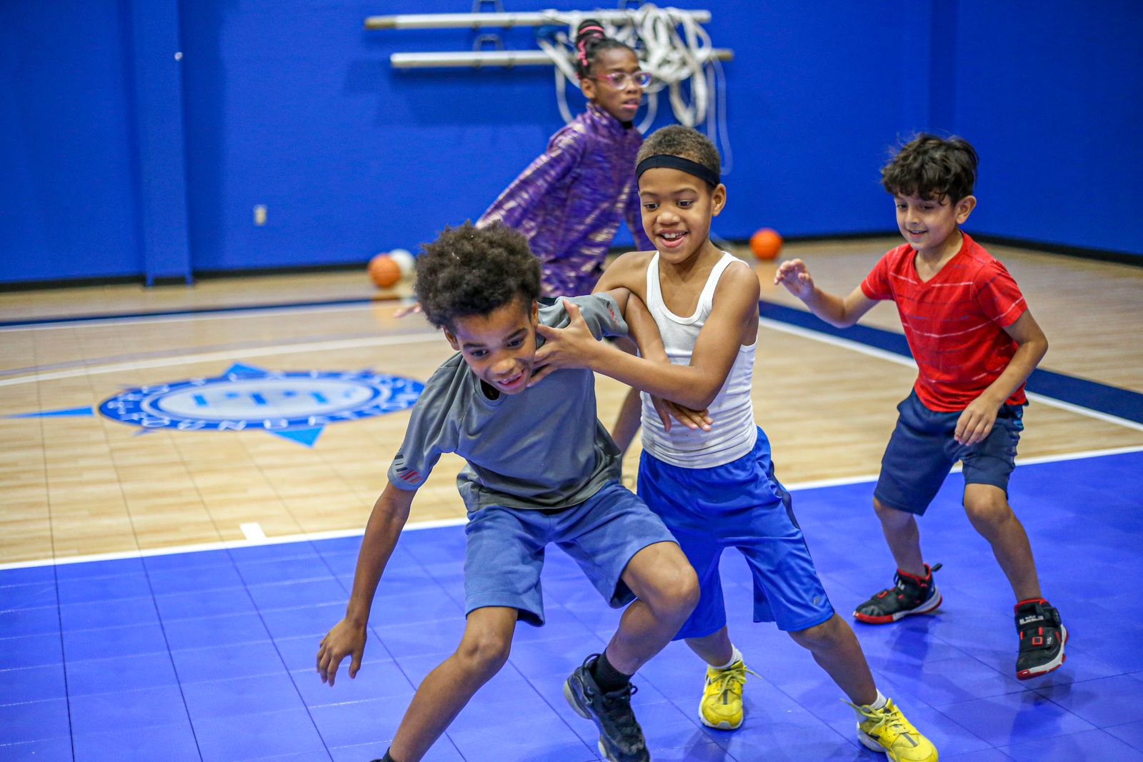 Youth playing basketball.