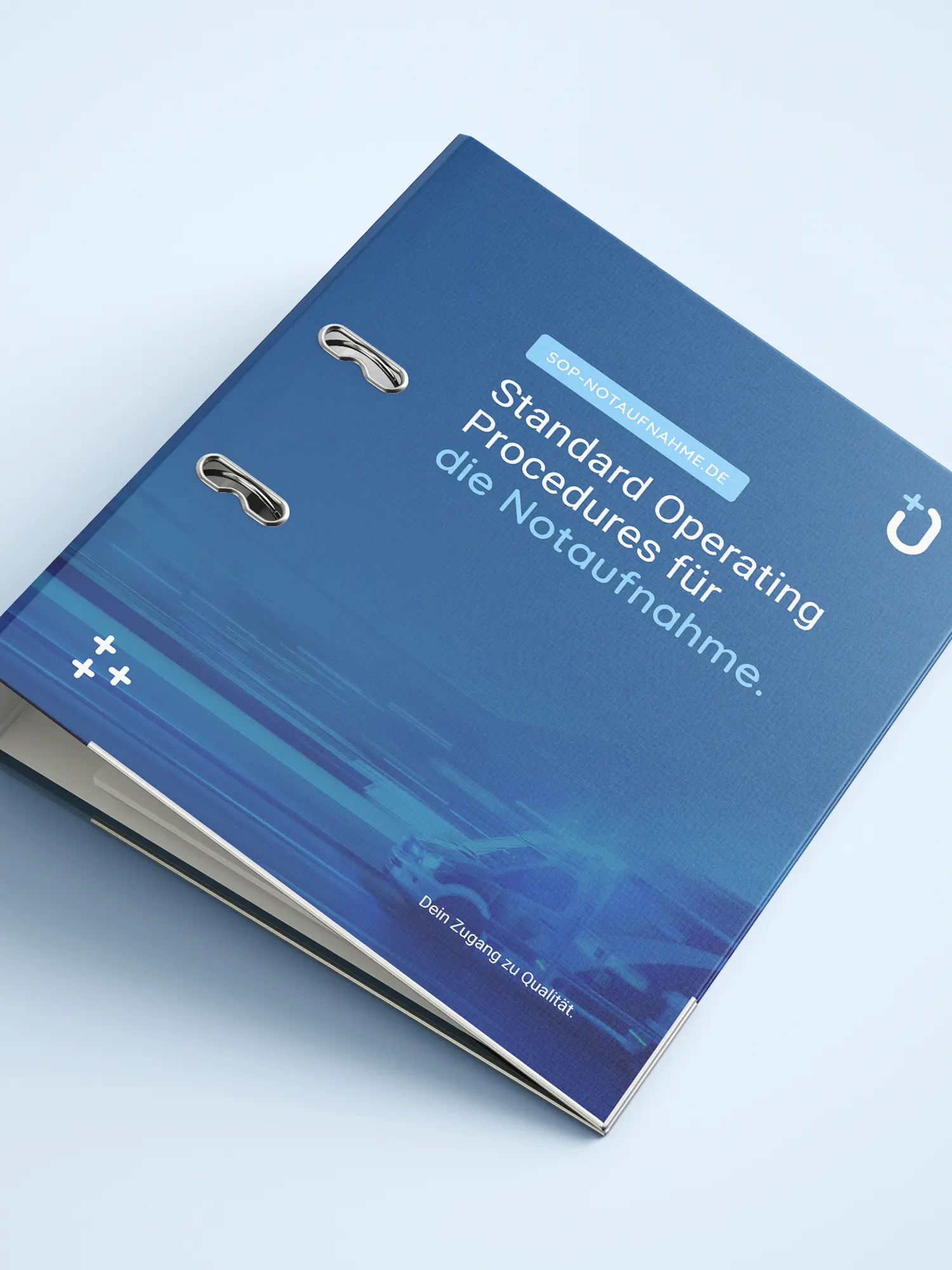 Mockup blauer Ringordner „Standard Operating Procedures für die Notaufnahme“ mit Rettungswagen-Motiv.