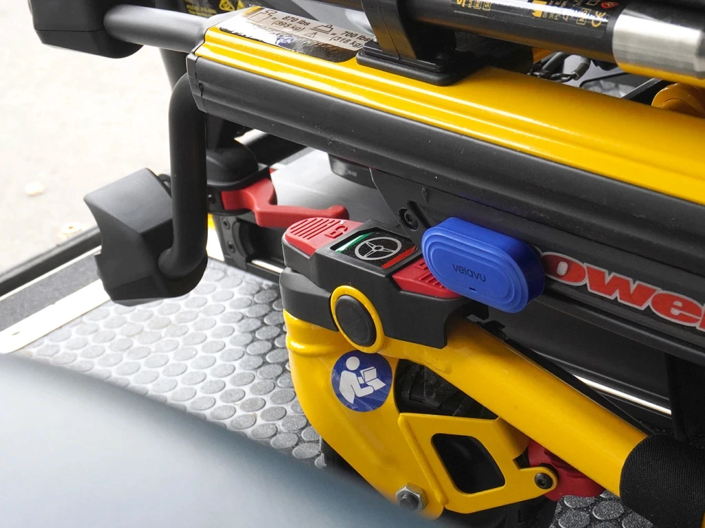 Velavu Pavo attached to a stretcher