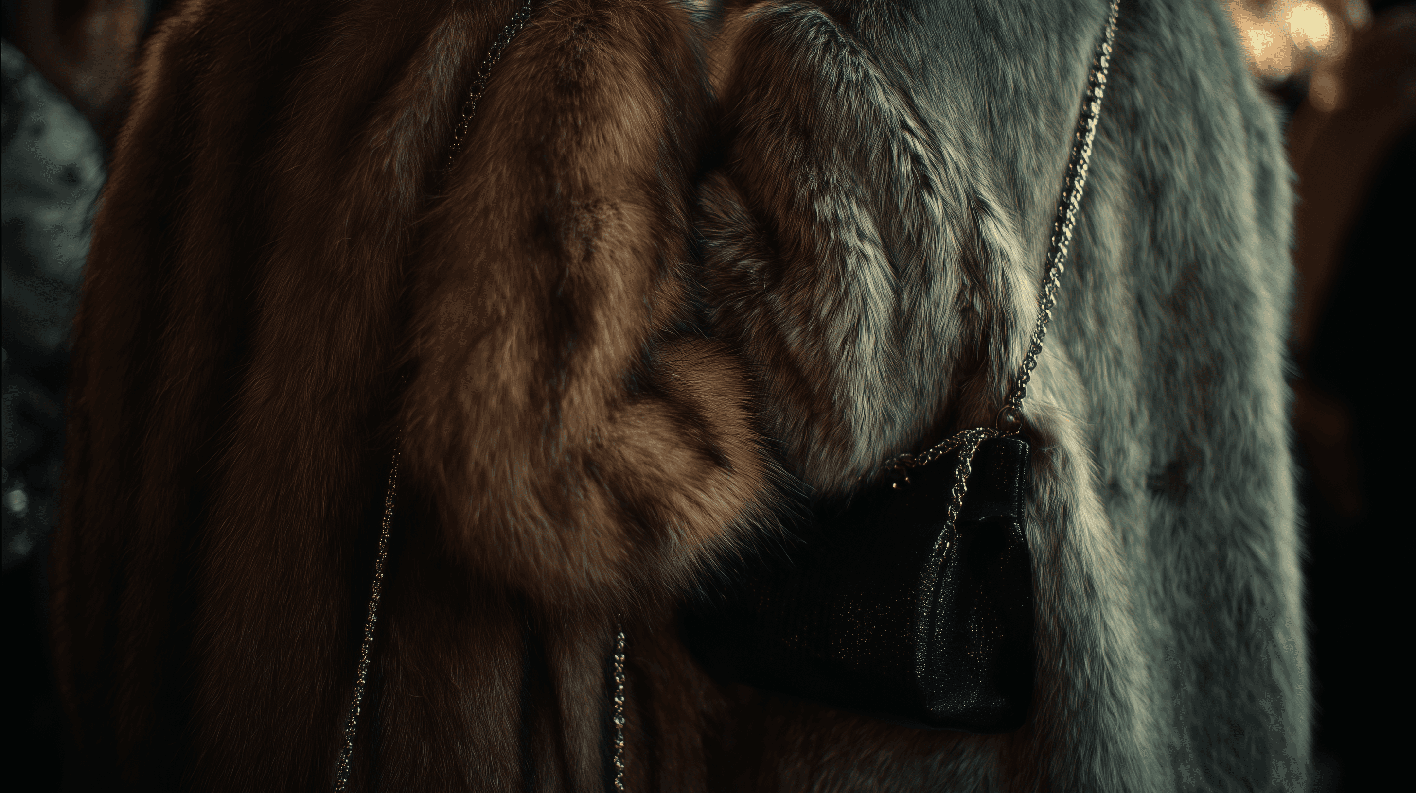 An AI generated close-up of two luxurious fur coats with a black chain-strap handbag, showcasing rich textures and upscale fashion details.