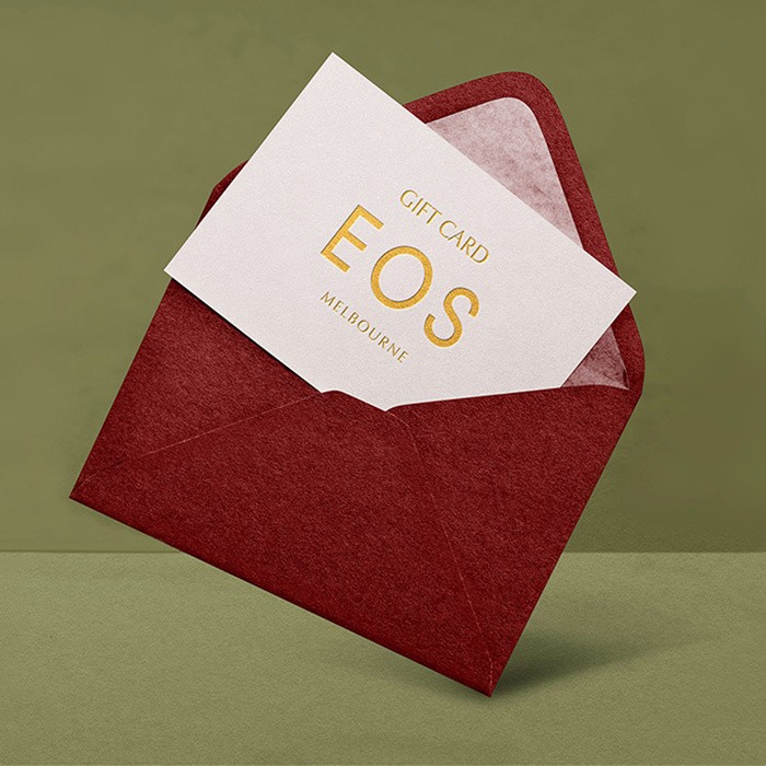 Perfume bottle resting over glowing lava