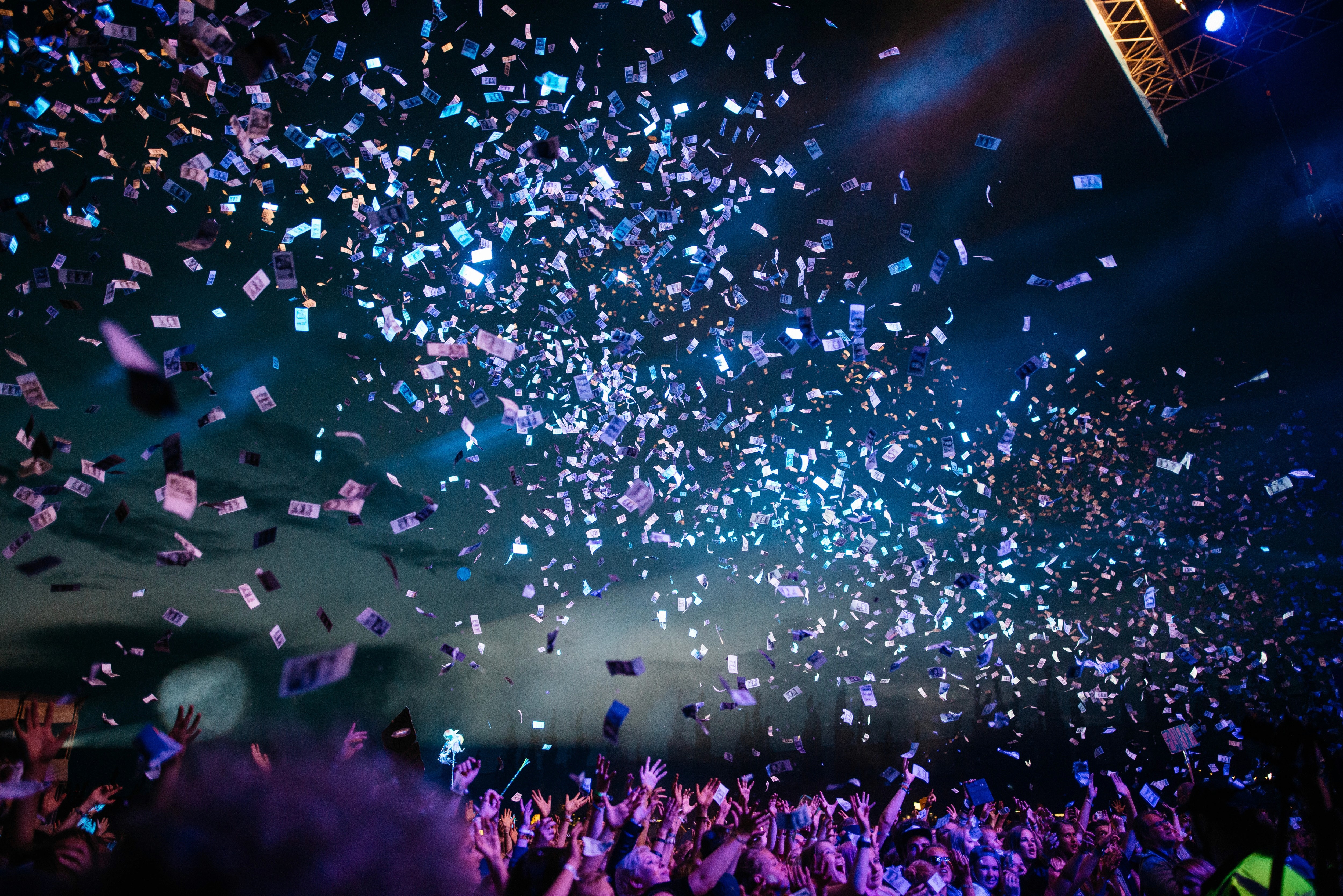 a concert with tickets in the air - find vocalists online