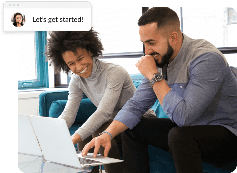 Happy dry cleaning business owners using Enlite software on their computers