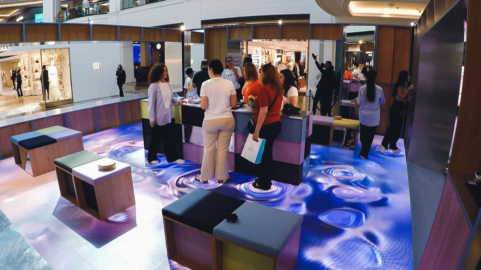 interactive-floor-people-at-experience-center-loewe-2