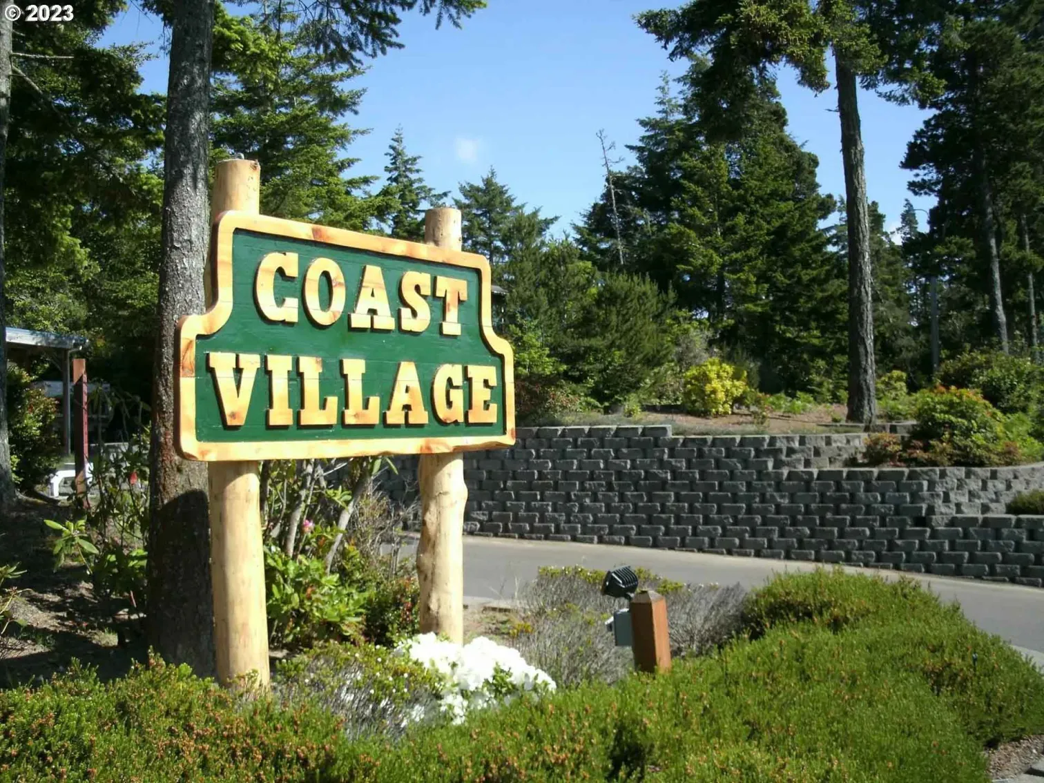 a group of children sitting on steps in front of a building