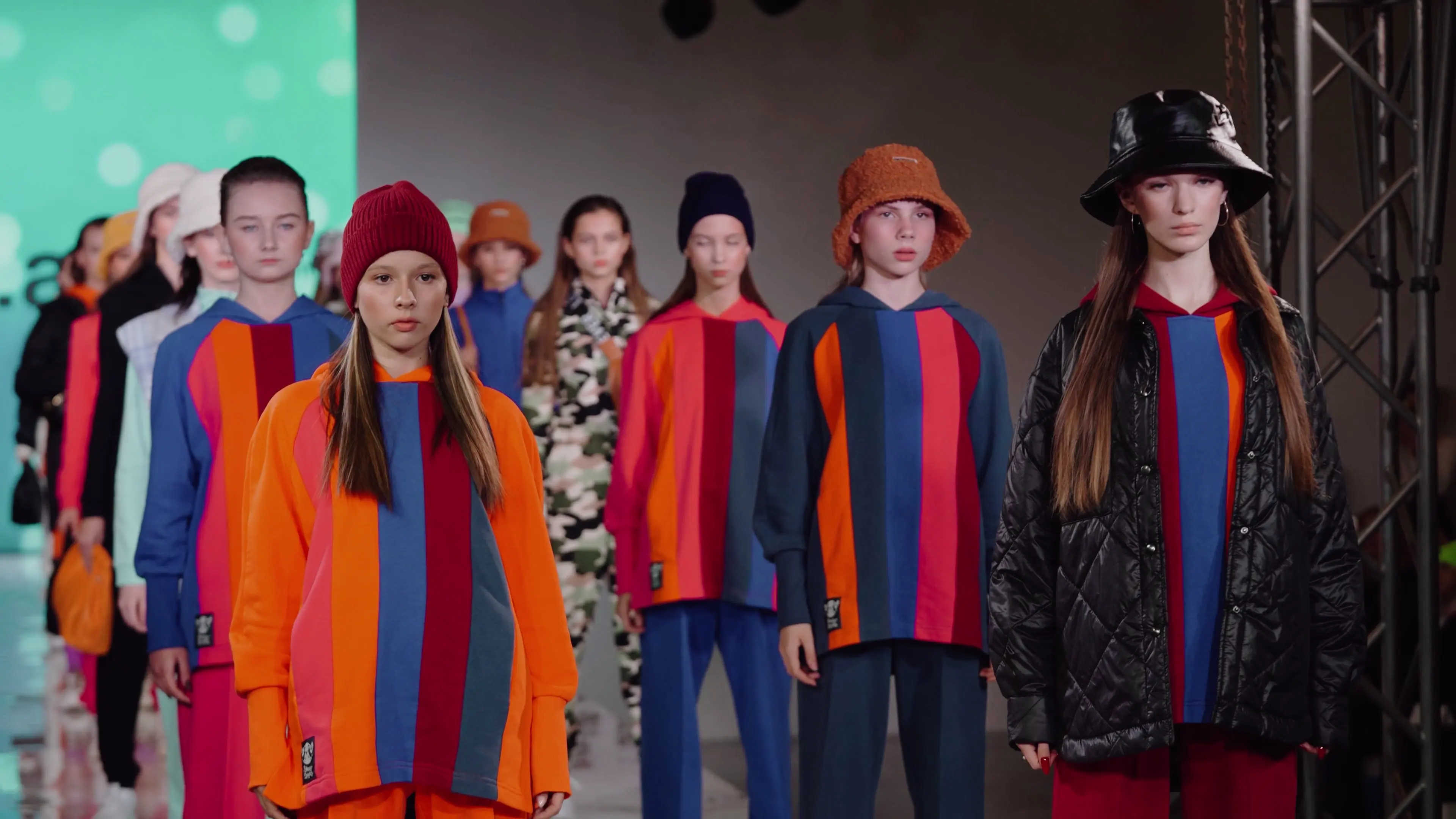 children in beautiful costumes at a fashion show
