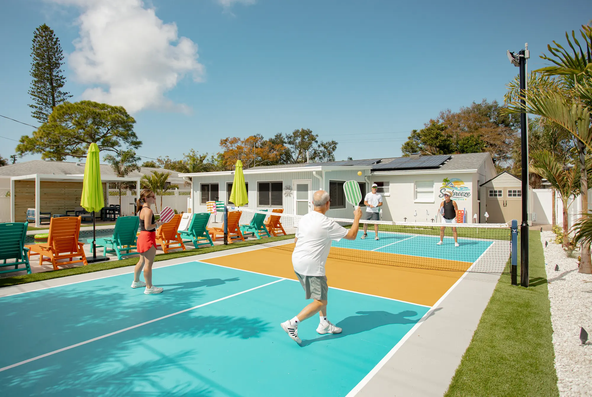 Guests playing pickleball on the private court at Pickleball Resort, Bradenton, Florida