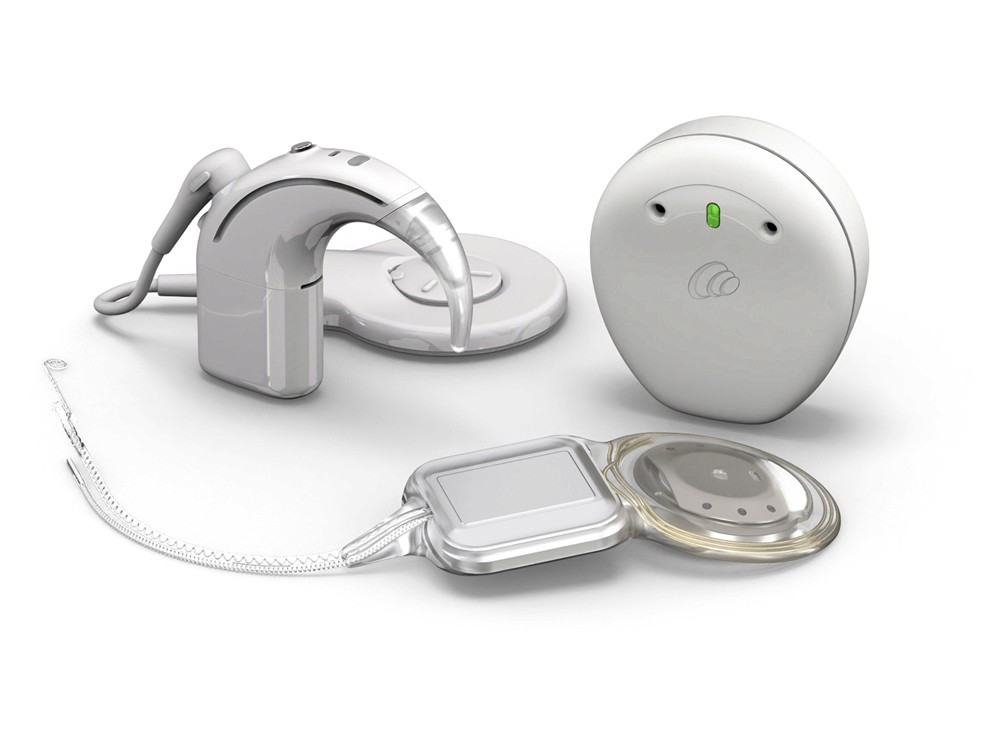 A cochelar implant device sitting on a desk