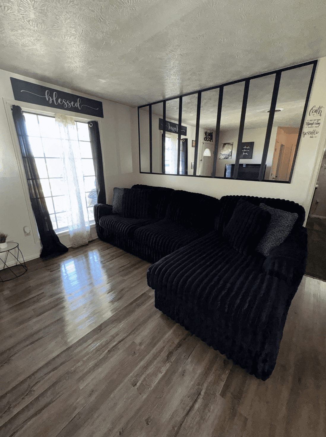 a white building with a black door