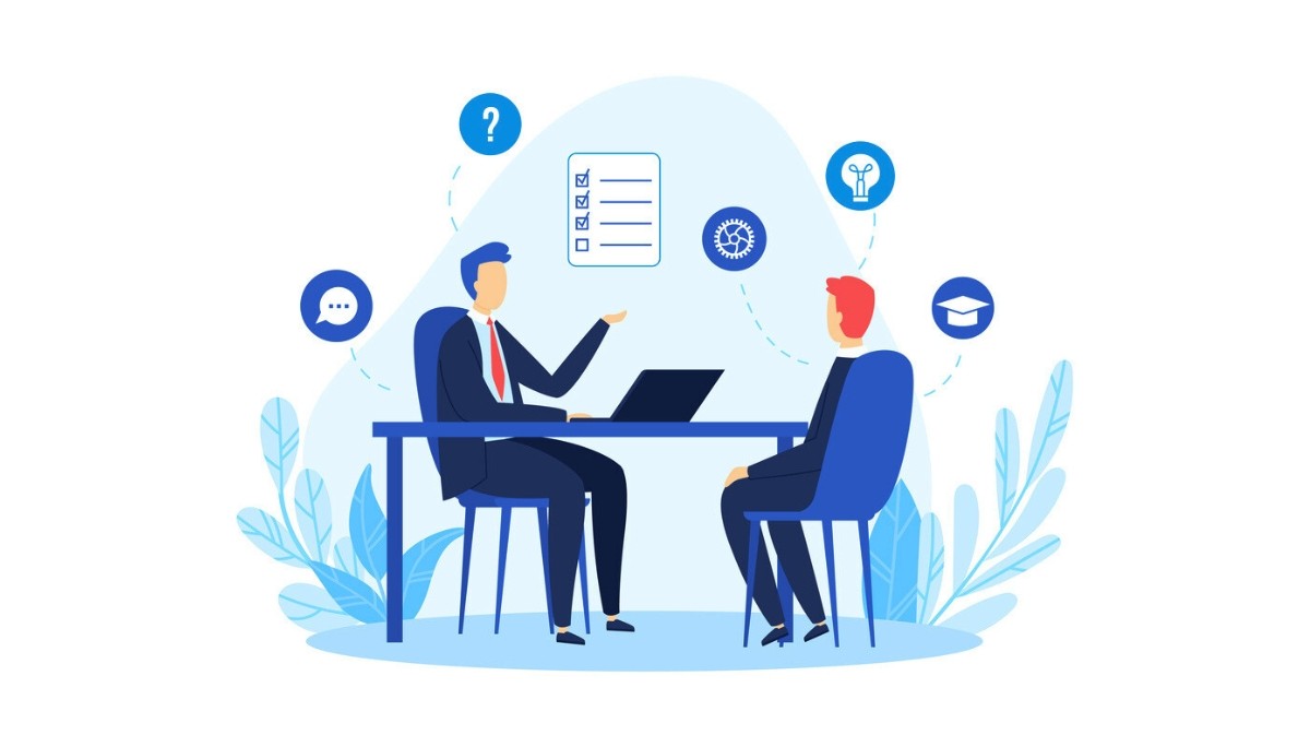 Illustration of two people seated across a table in a professional interview setting, one speaking with a laptop open while the other listens, surrounded by icons for communication, questions, checklists, ideas, and qualifications.