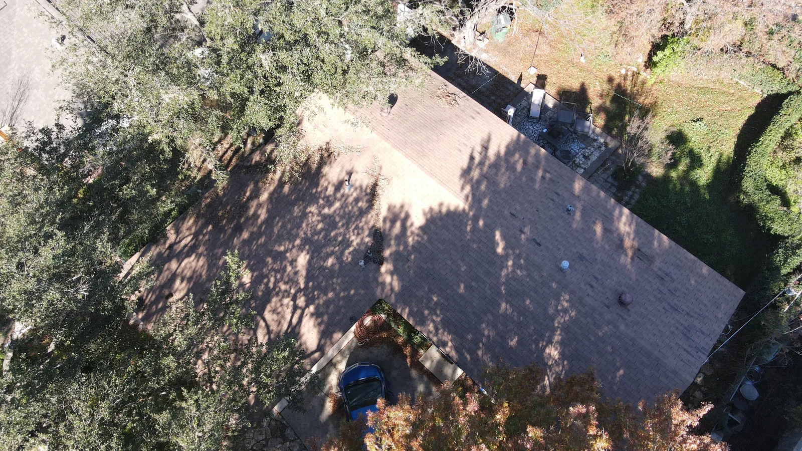 Before - another angle: brown to charcoal shingles.