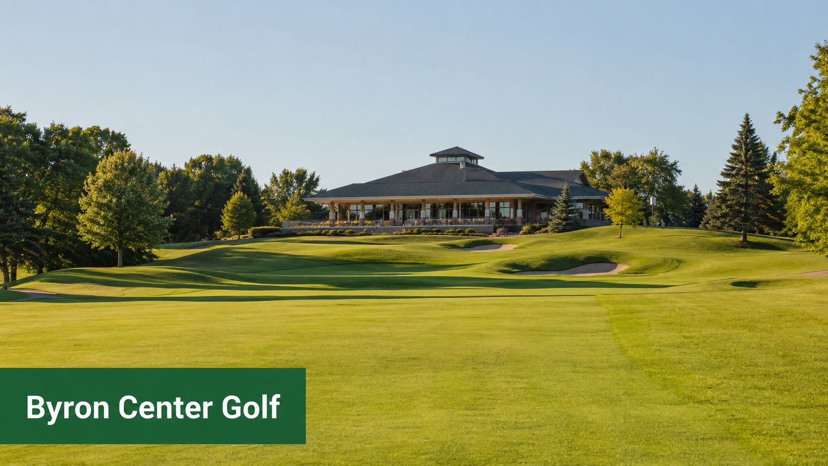 The scenic green fairway of Railside Golf Course with the clubhouse building visible in the background.