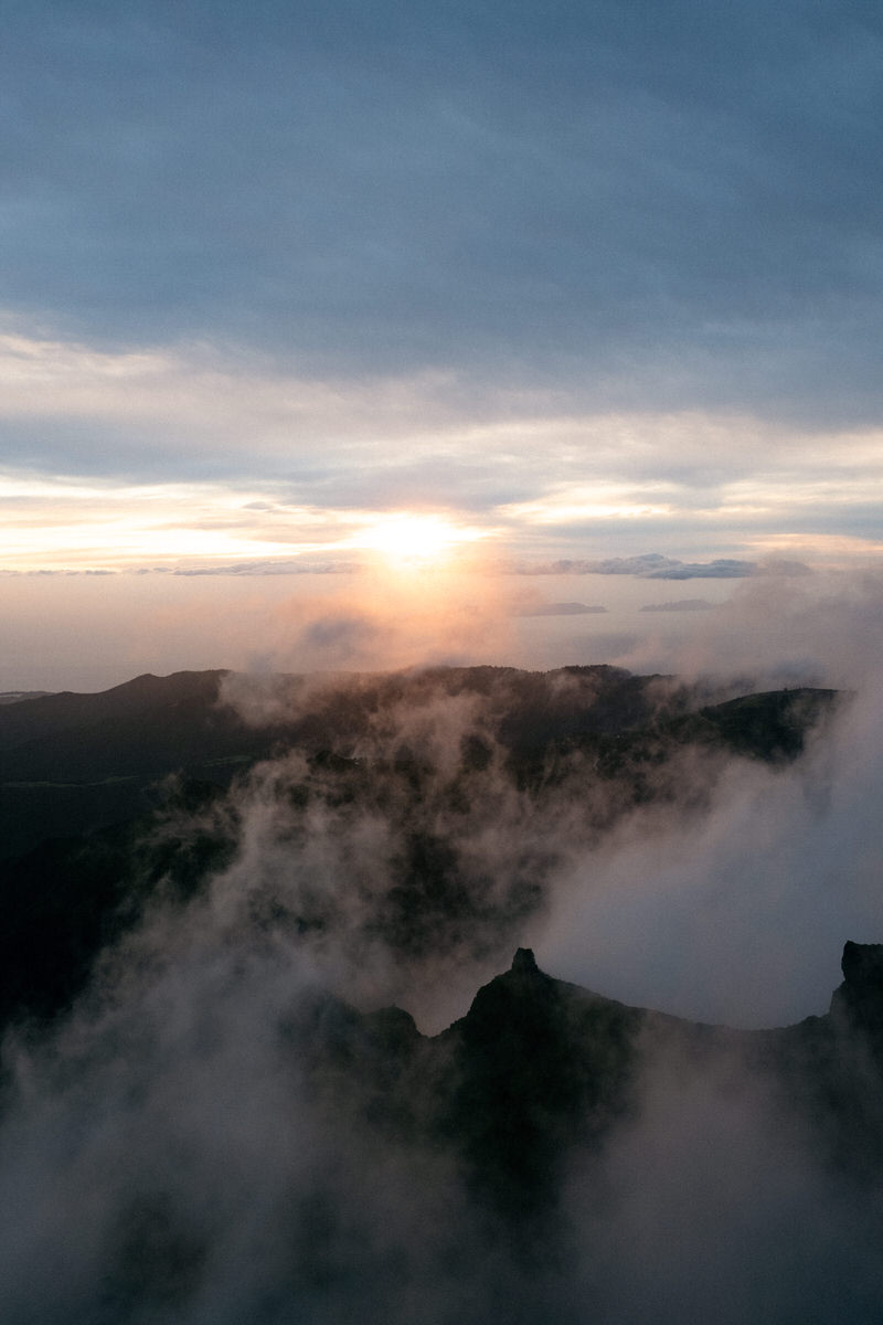 madeira island sunrise at pico do arieiro with clouds rolling in