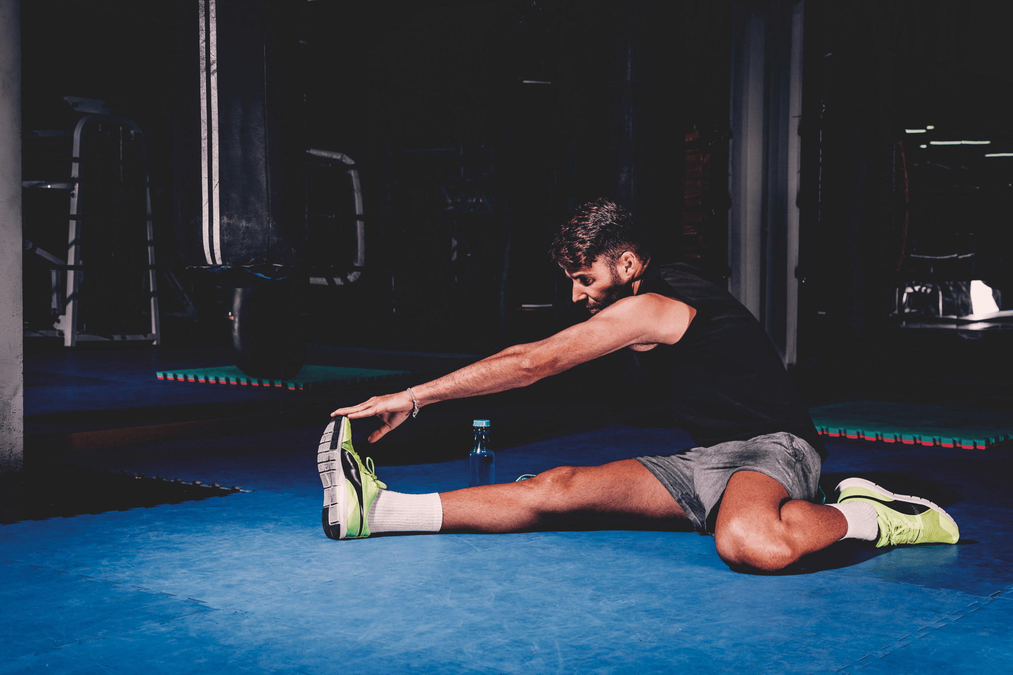 Man doing a warm-up before his gym workout.