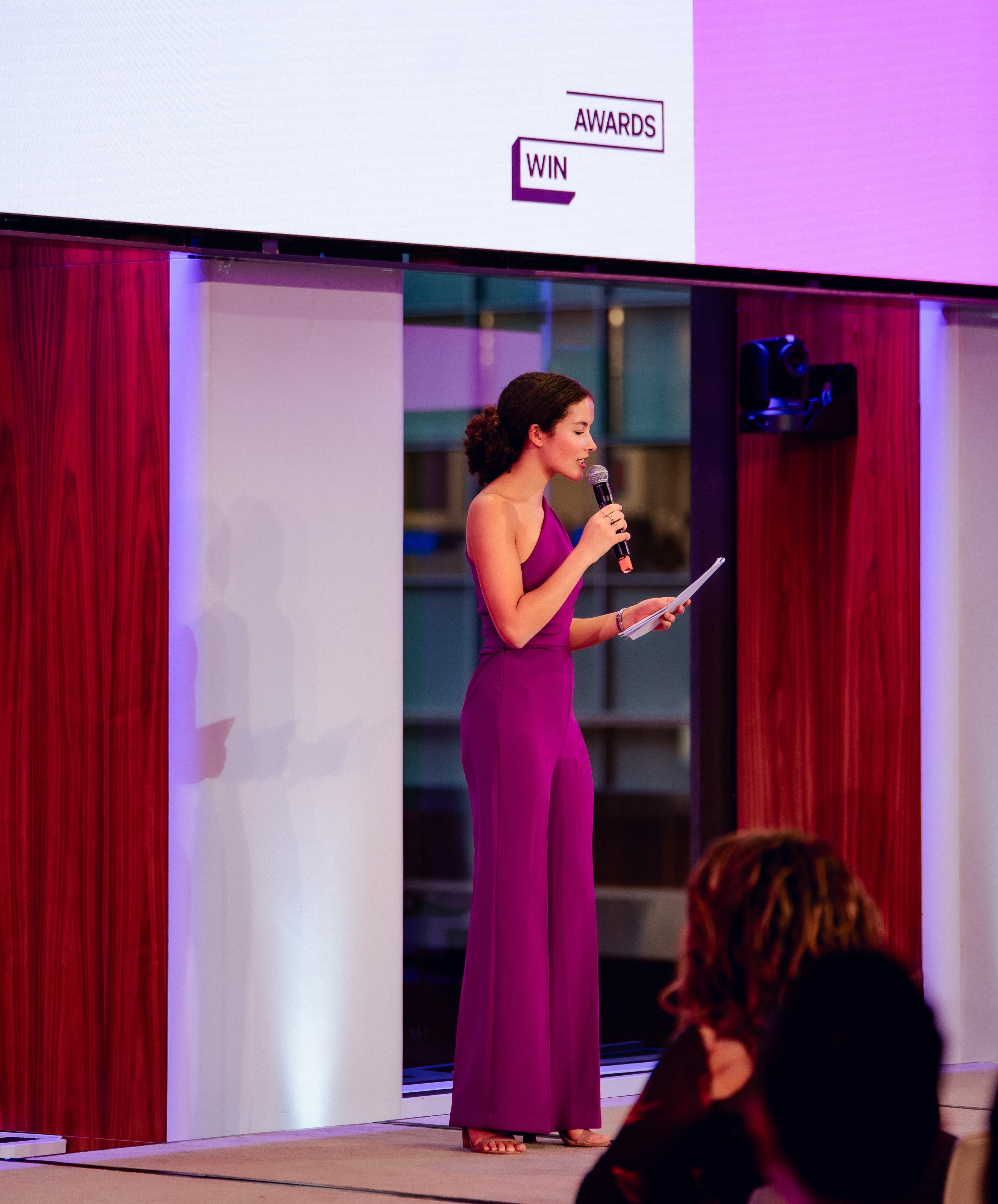 Image of Sabrina Romviel speaking at the WIN Awards
