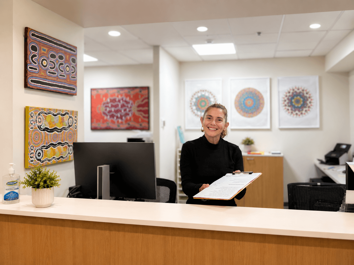 Doctor consults with patient in medical office