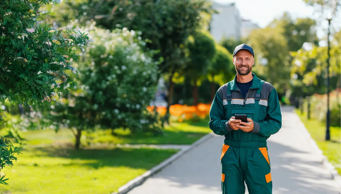 Gardener in a green suit