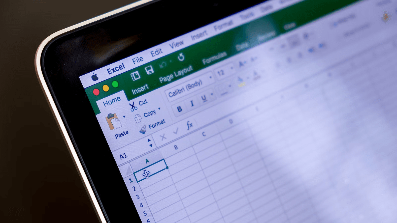 Laptop displaying Microsoft Excel Sheet - How to Create an Expense Tracker in Excel