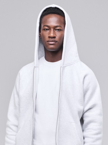 Man wearing Sunday Superior light grey zip hoodie