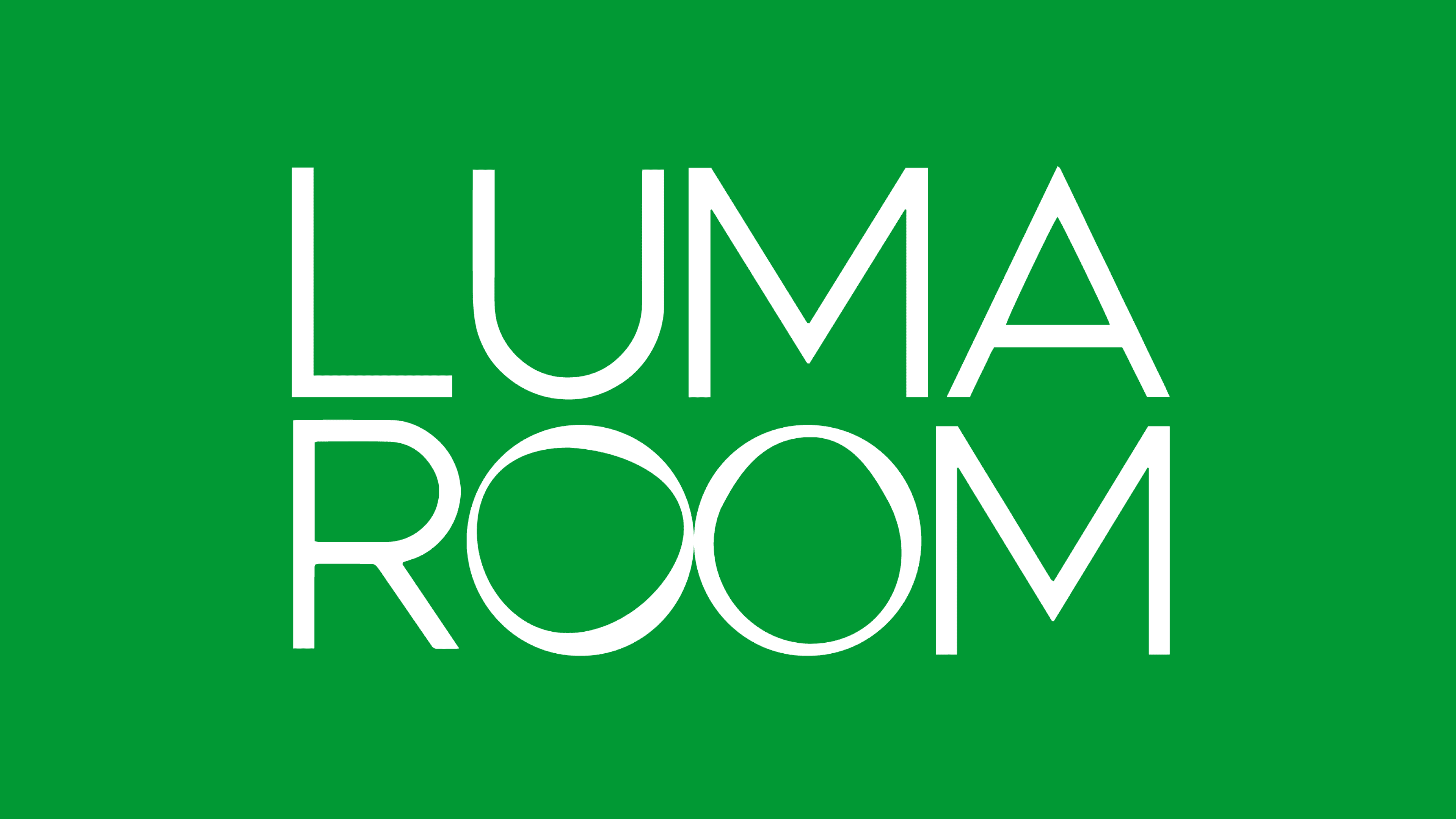 The white logo of luma room on a  green background