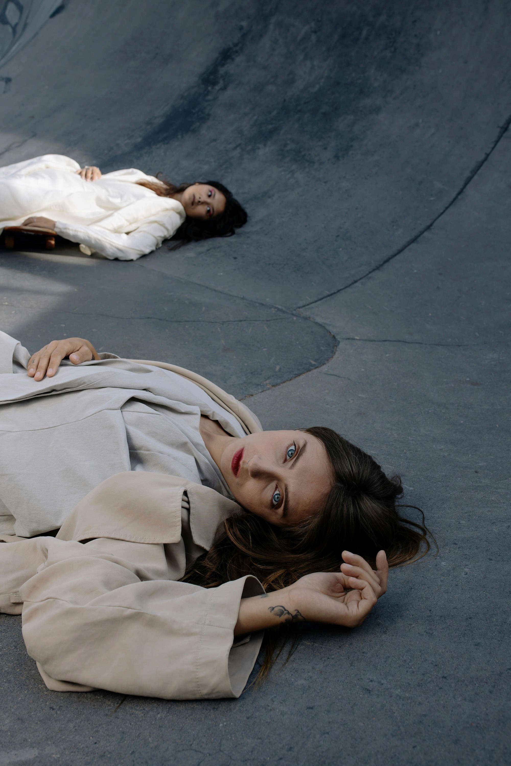 Girls lying on a skate park