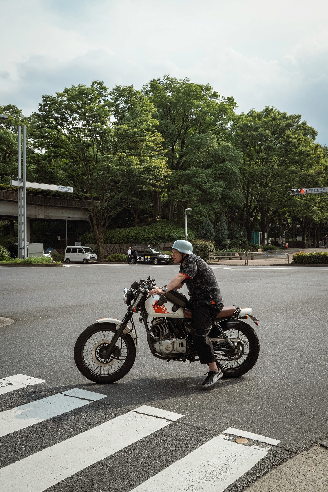 man on motorbike at crossing