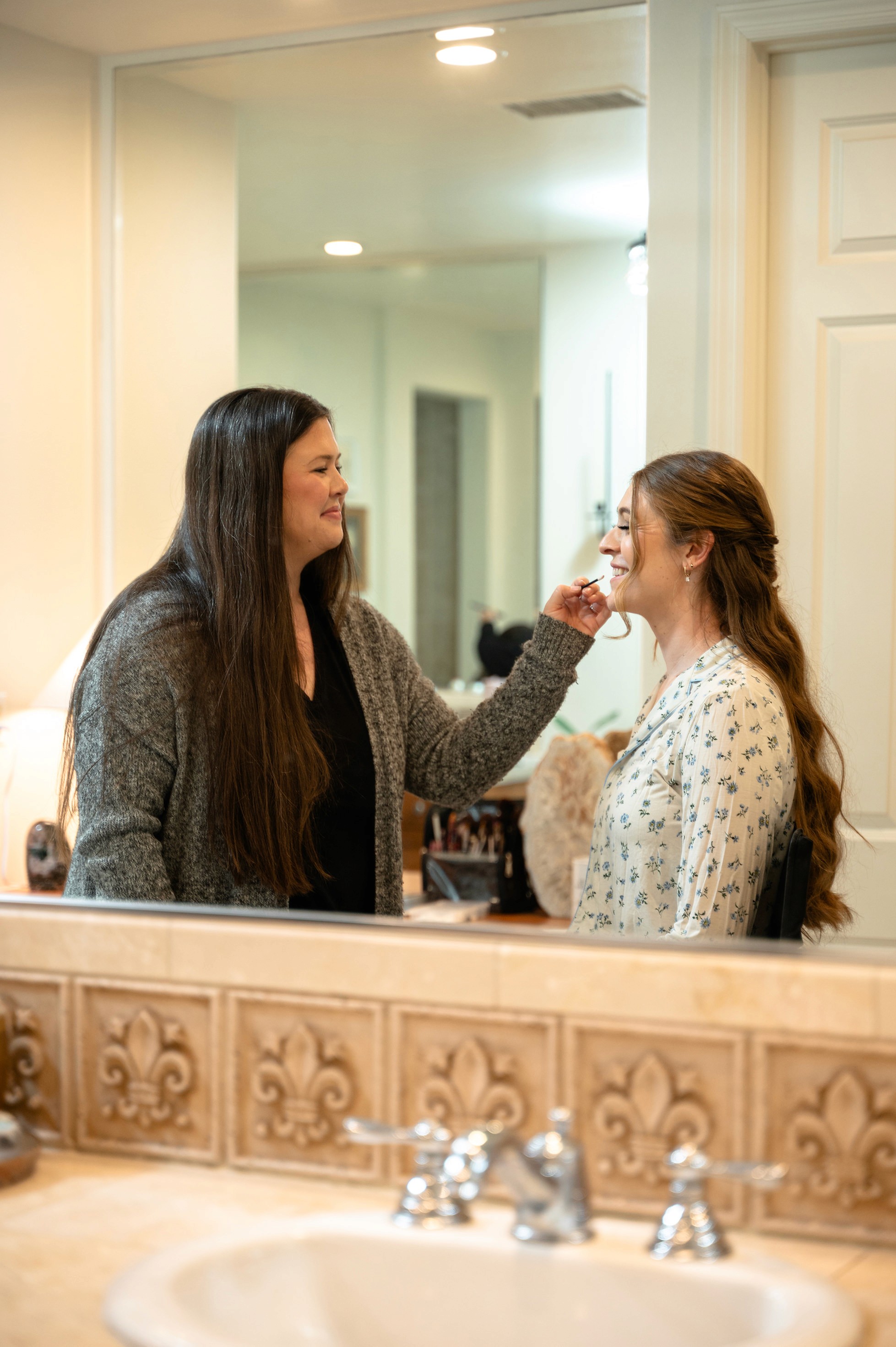 Flat lay wedding details with bouquet, rings, and sparkling bridal heels