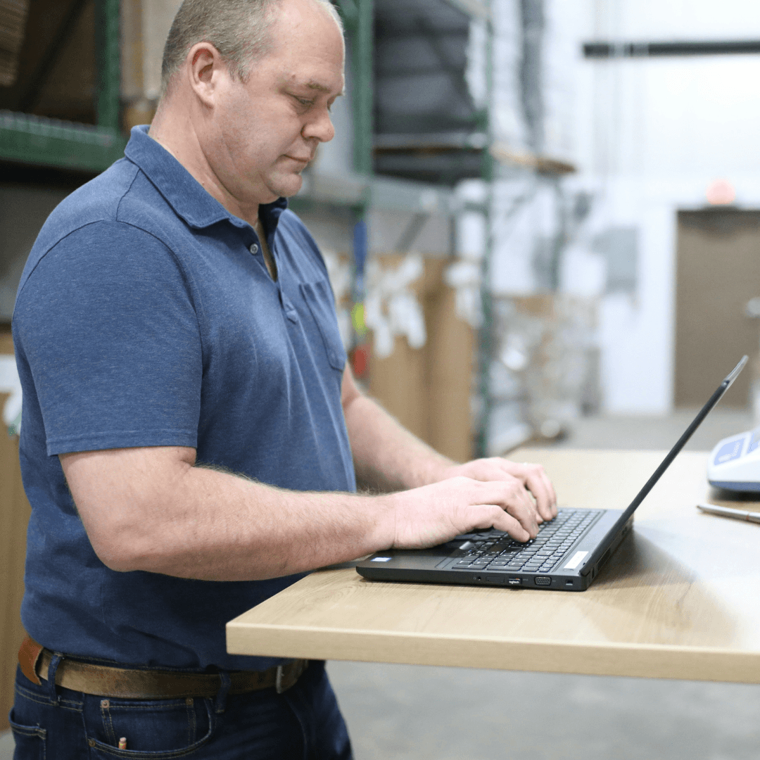 Logistics manager accessing photo documentation system to streamline claims management and exception handling