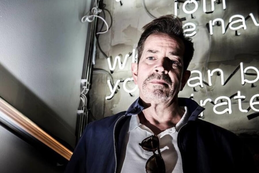 Historic storefronts line a charming small-town street.