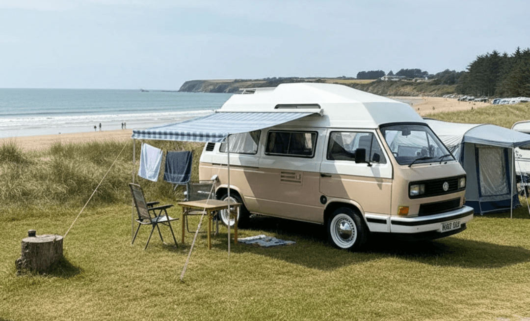 retro vw campervan on a campsite