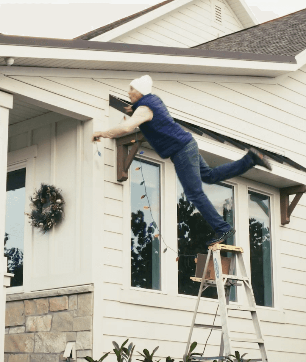 A man falling off a ladder