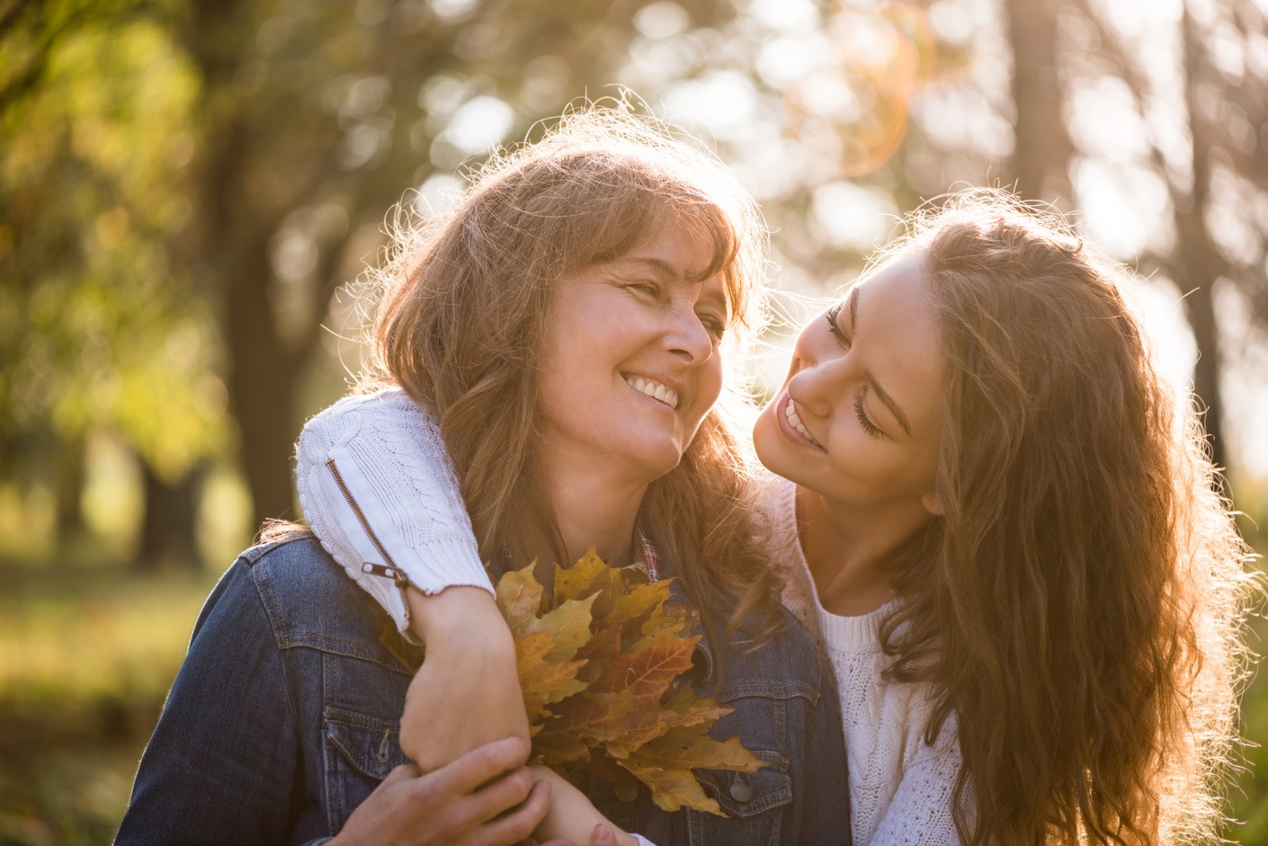 Mother and daughter playing in the park