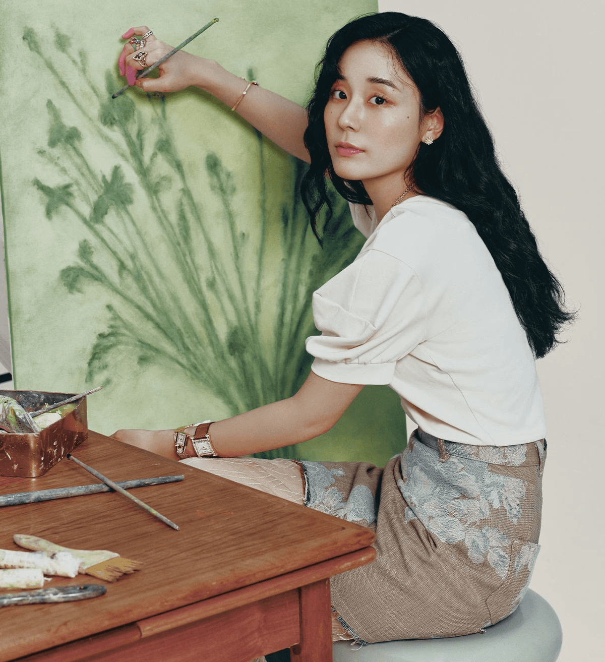 Laptop displaying website on wooden table