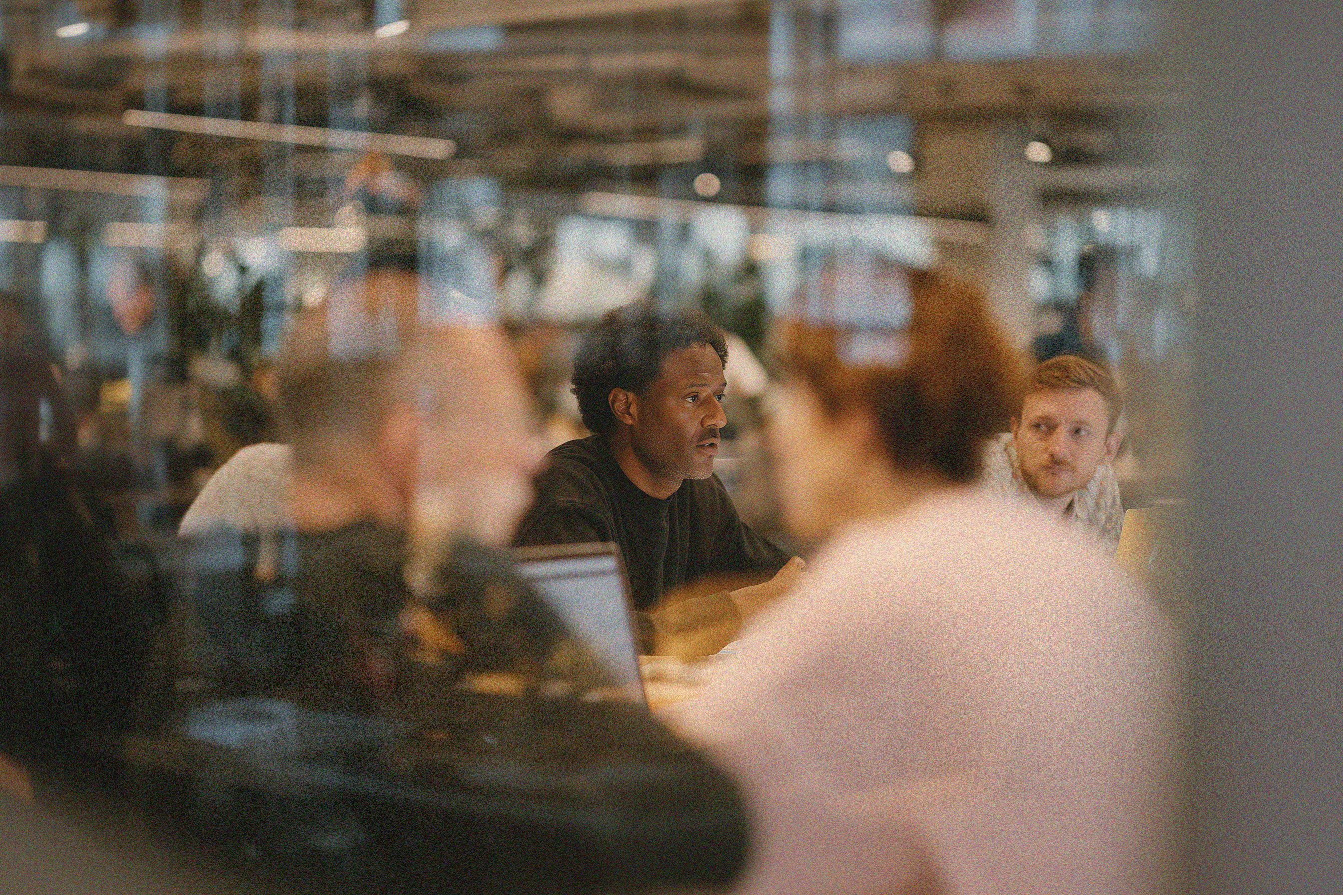 Team working in an office watching at a presentation