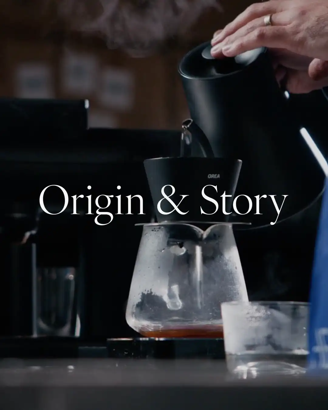 Origin & Story coffee subscription brand visual showing hand-brewed pour-over coffee with elegant typography overlay.
