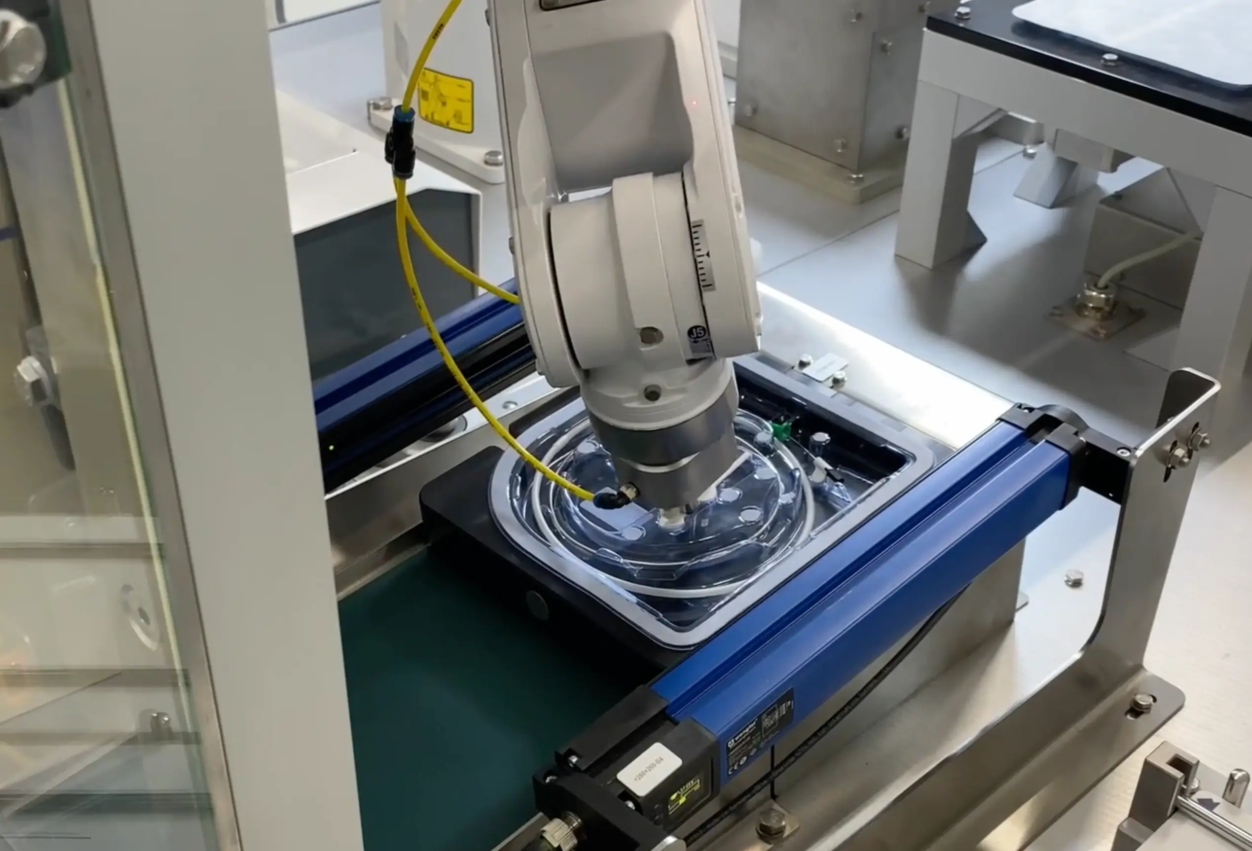 Industrial Robot is packing sensitive medical products
