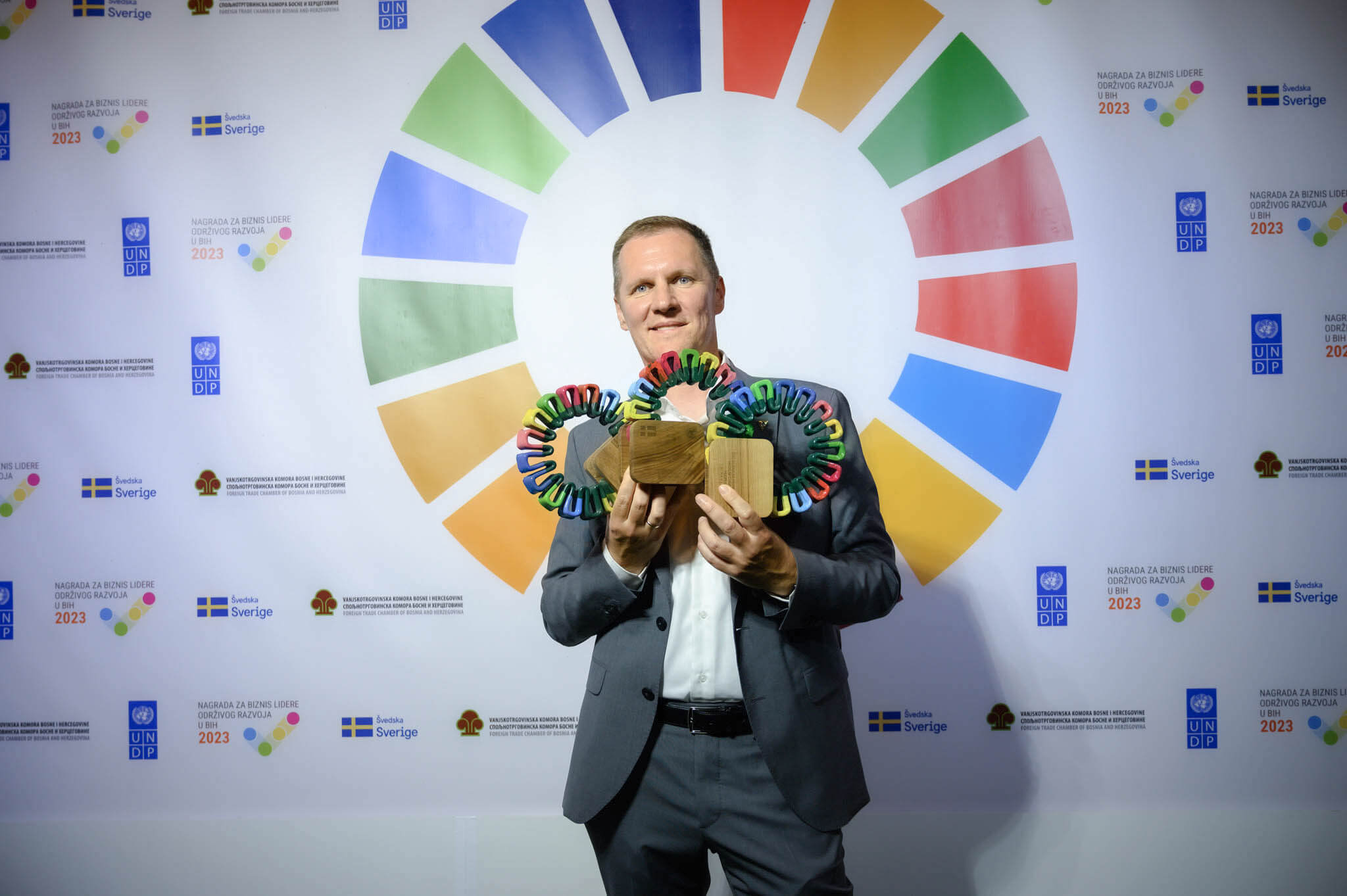 Klika receiving SDG Business Pioneer Overall Winner Award 2023