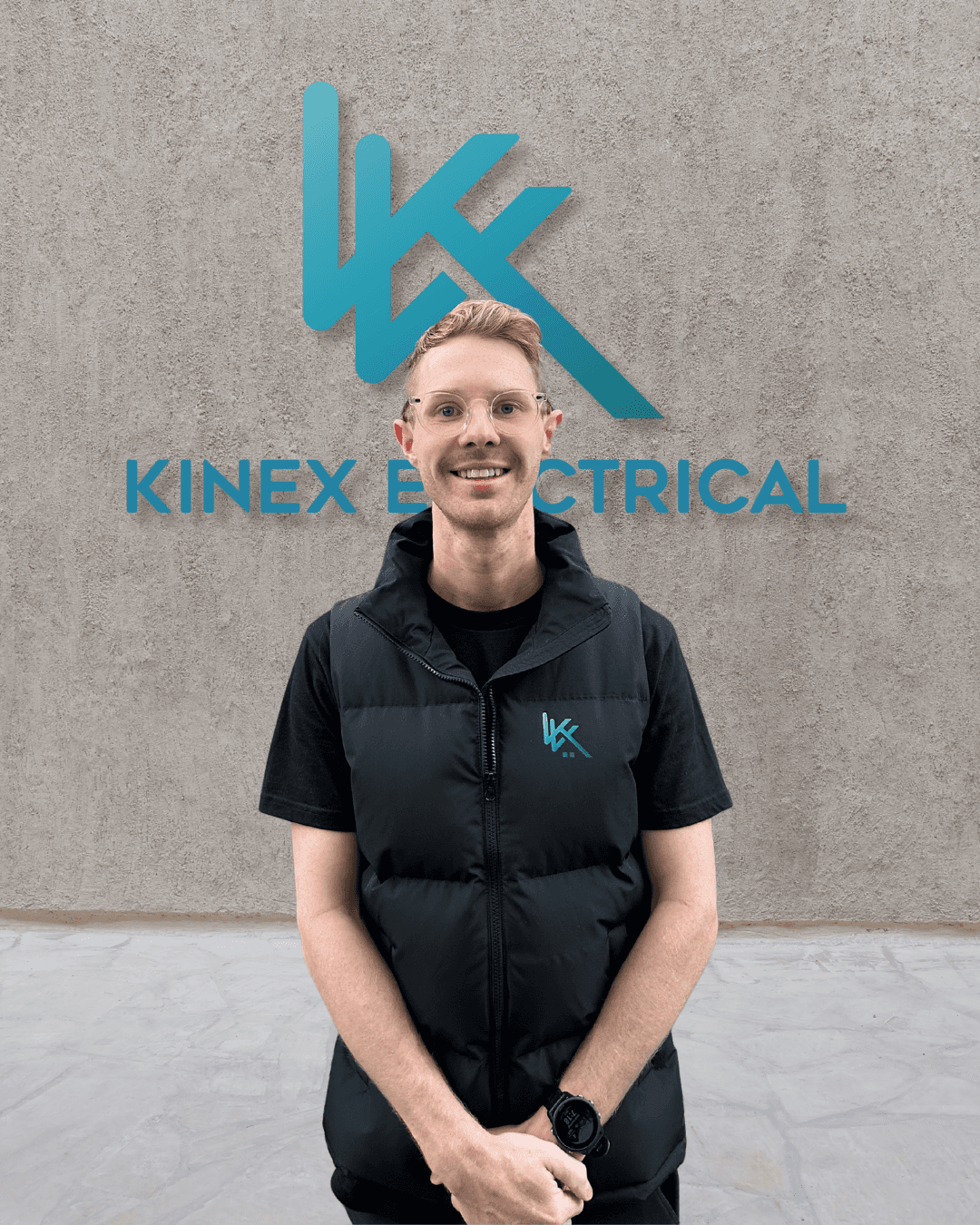 Electrician drilling in a wall