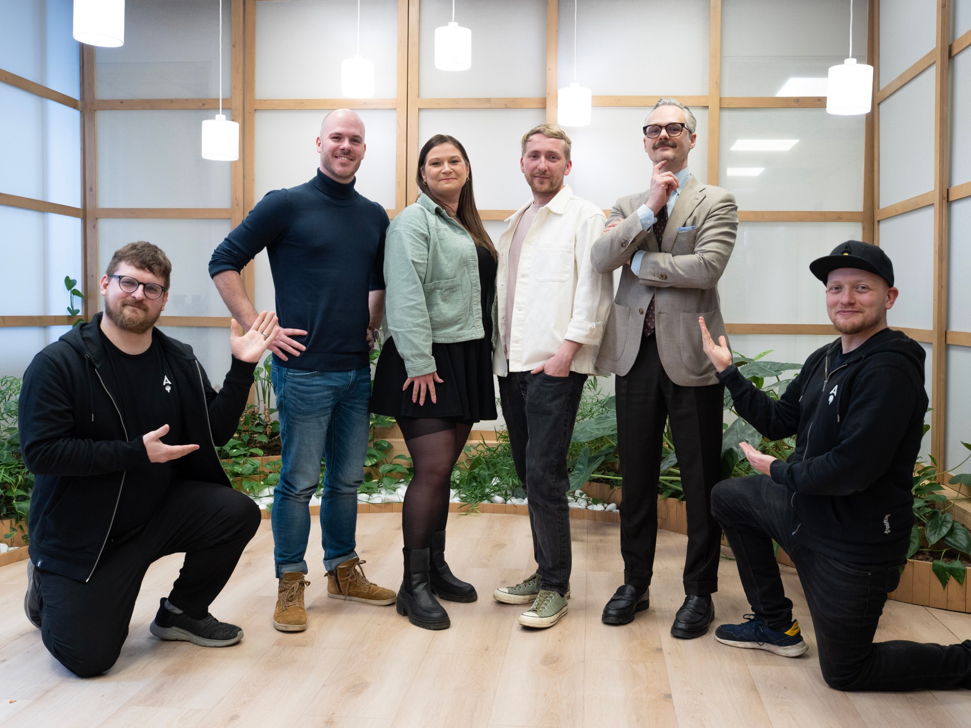 Applifting founders symbolically handing over leadership to the new C-team.