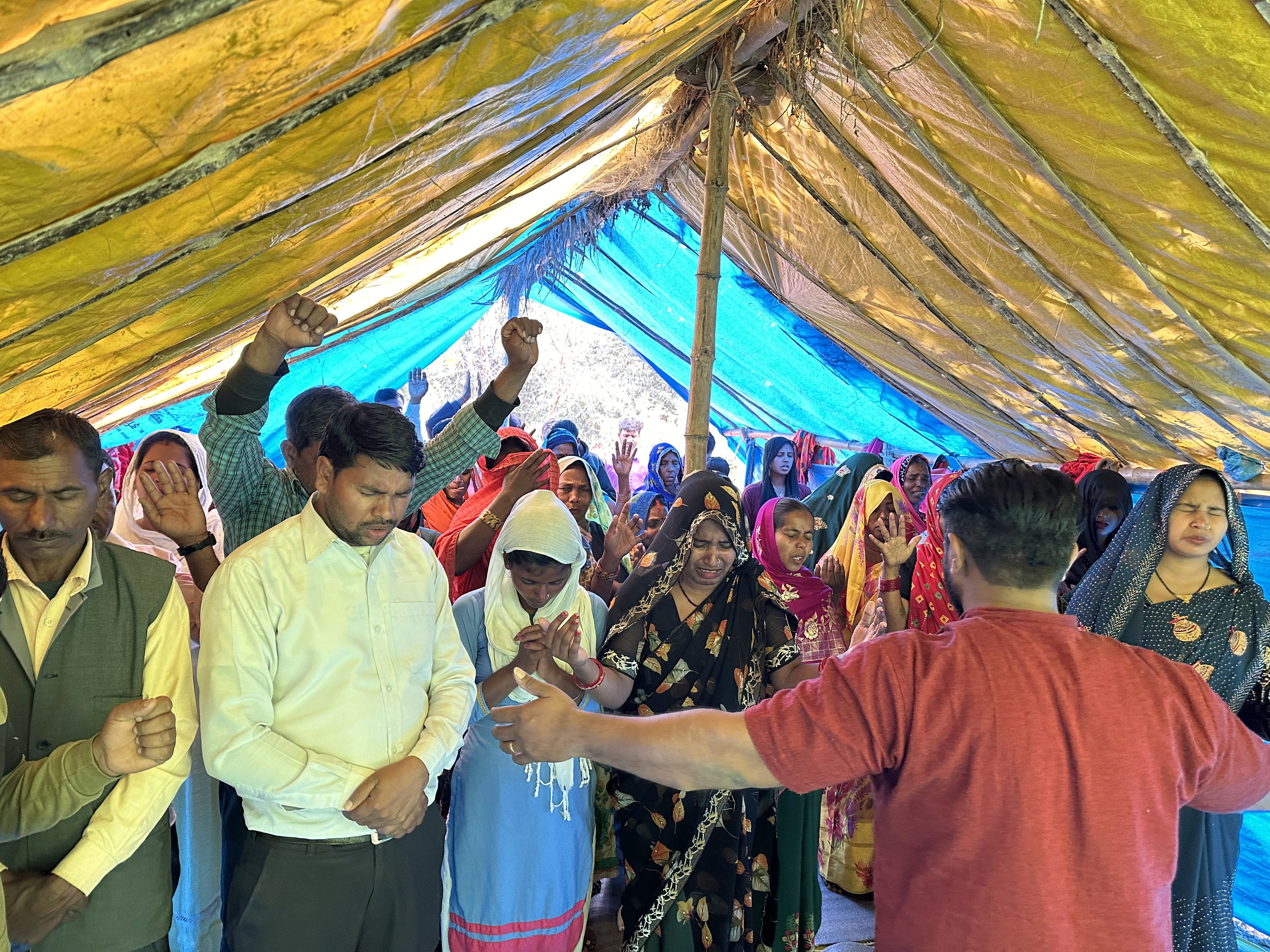 two men hugging on focus photography