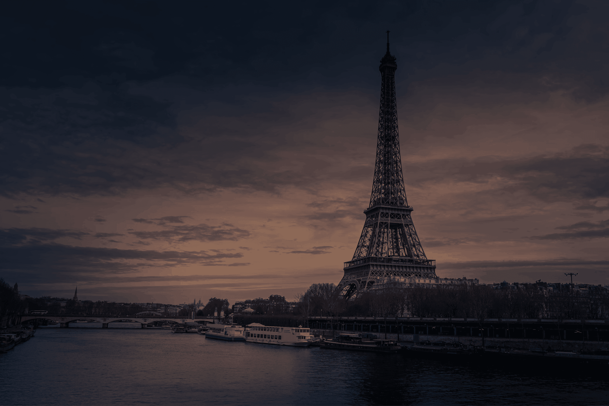 the eiffel tower is reflected in the water